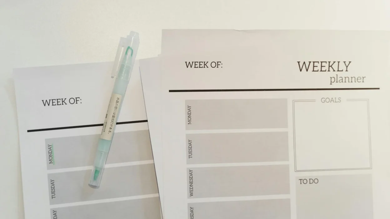 Colorful printable budget binder with monthly expense trackers, savings goals, and bill organizers.